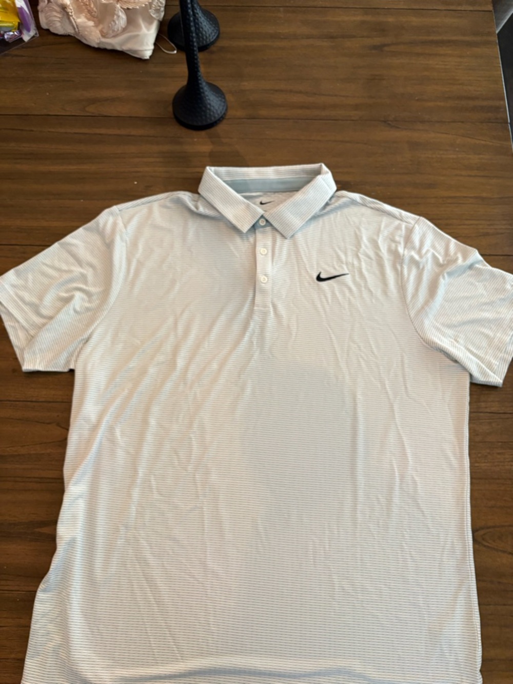 Nike Men’s Light Blue Micro-Striped Polo with Black Swoosh